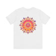 A colorful and intricate mandala design tee, representing spiritual peace and harmony