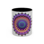 A close-up image of a grey ceramic mug with a vibrant mandala design