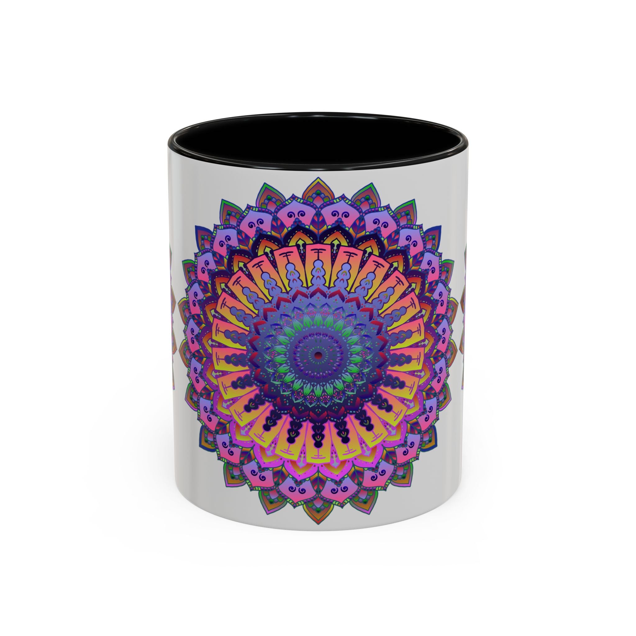 A close-up image of a grey ceramic mug with a vibrant mandala design