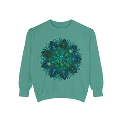 A detailed teal and blue mandala sweatshirt showcasing intricate and mesmerizing design patterns