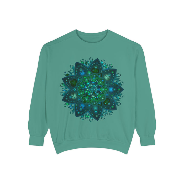 A detailed teal and blue mandala sweatshirt showcasing intricate and mesmerizing design patterns