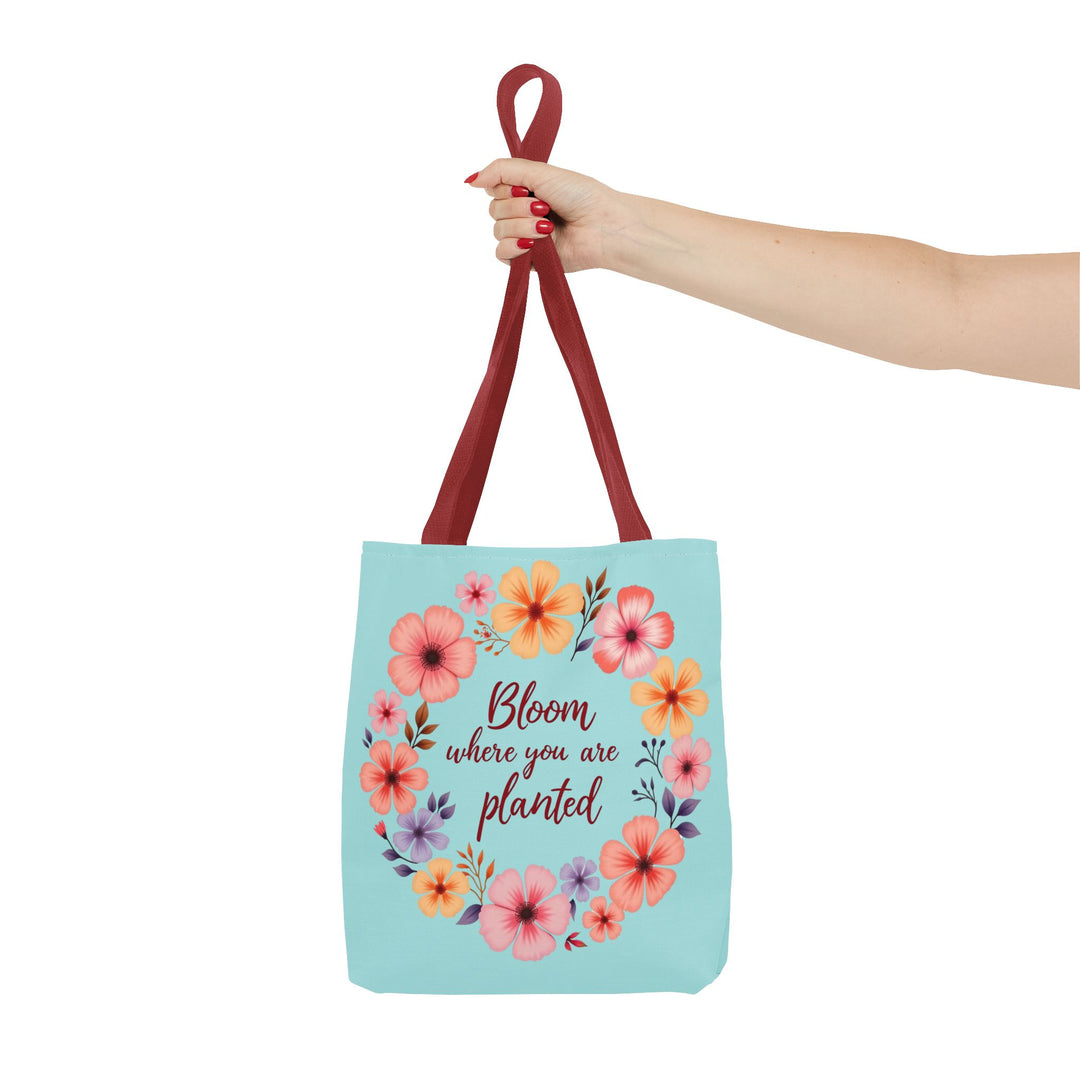 A charming floral tote bag featuring the inspirational quote Bloom Where You Are Planted in three different sizes - perfect for carrying all your essentials in style