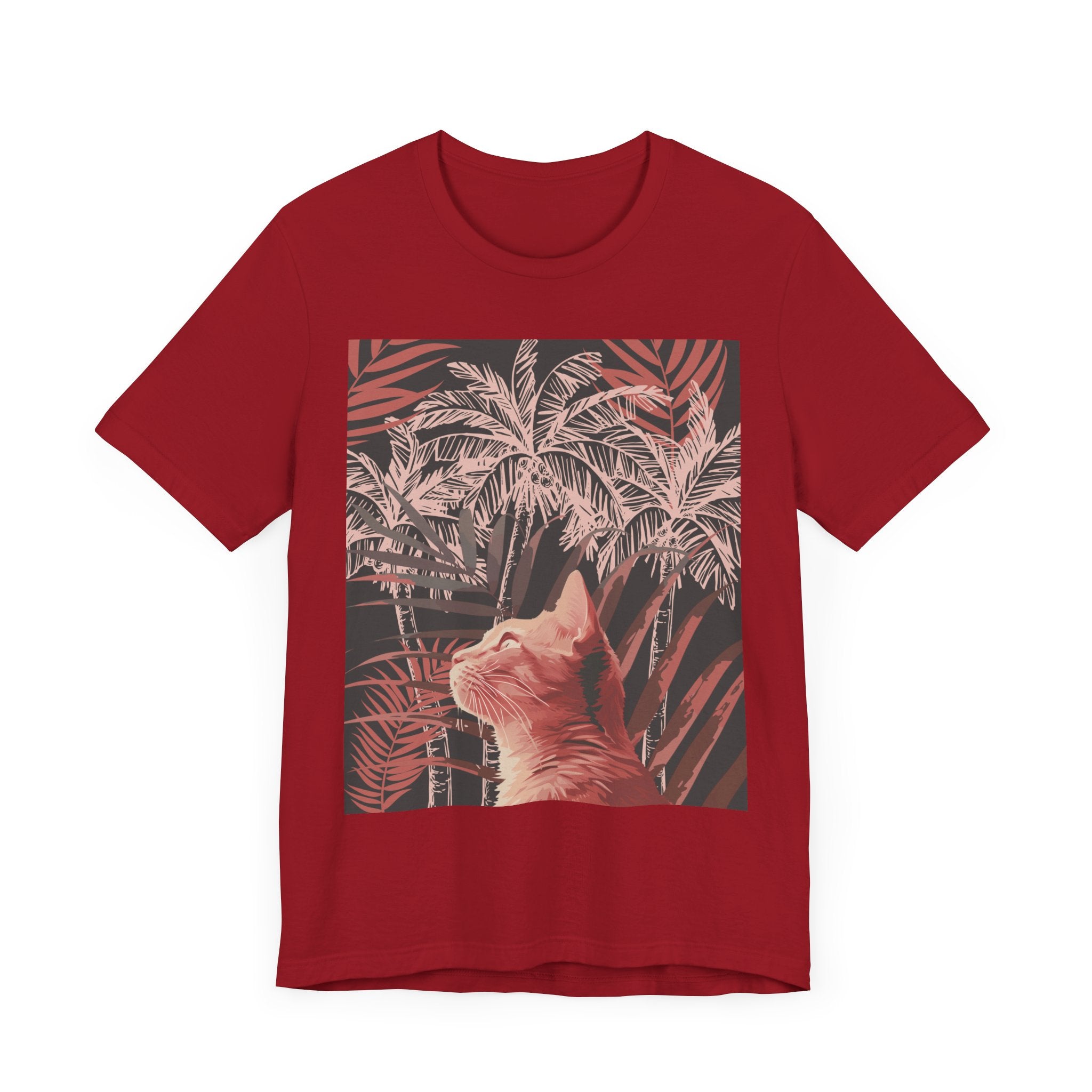 A charming ginger cat lounges beneath a lush palm tree on this stylish and comfortable tee