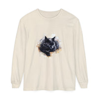A detailed watercolor illustration of a black cat sleeping on a t-shirt