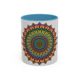 A beautifully handcrafted ceramic mug featuring a vibrant mandala design, perfect for spiritual and colorful art enthusiasts