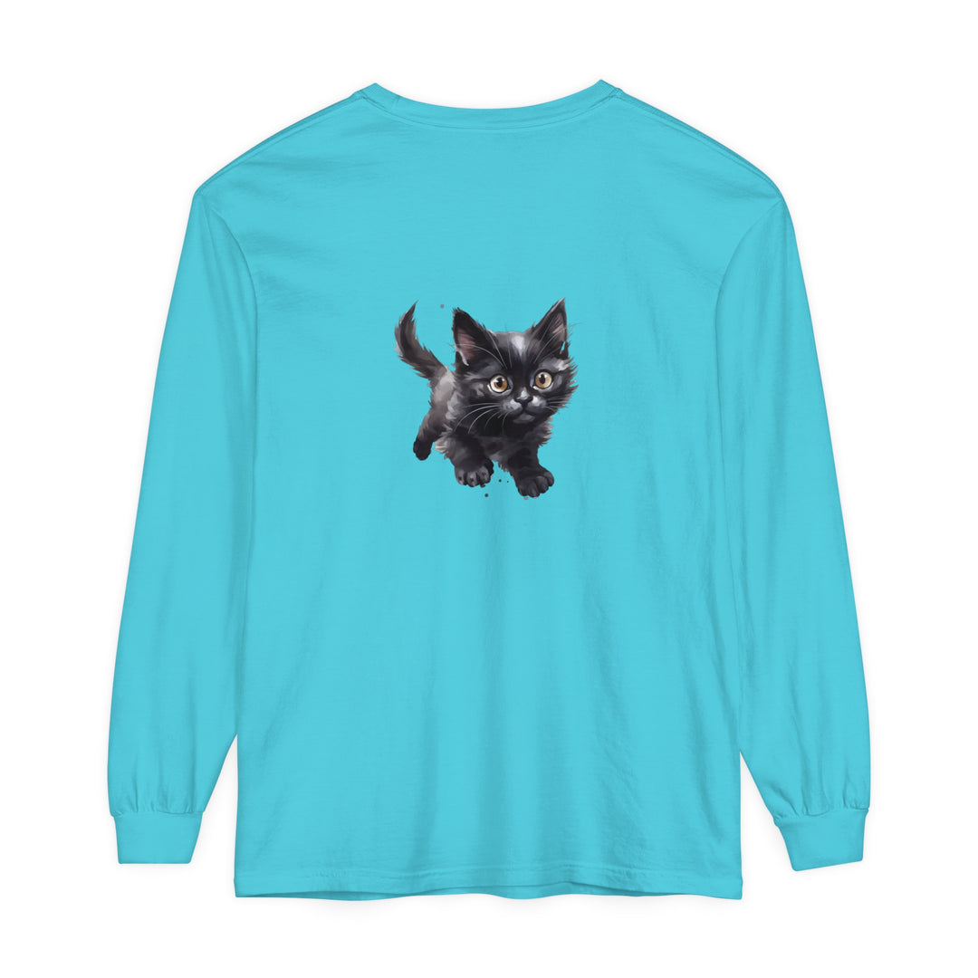 A colorful watercolor illustration of a playful kitten on a t-shirt