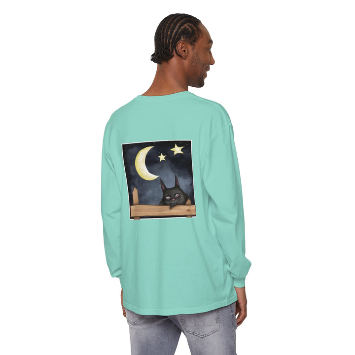 A comfortable black t-shirt with a sleepy cat and night sky design