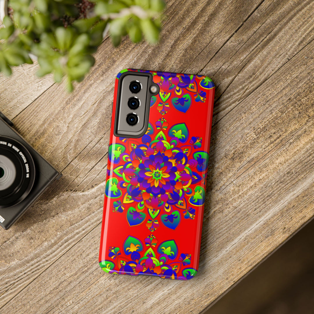 Hand drawn mandala art in red and white on a phone case with intricate patterns and details