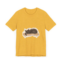 A beautifully detailed watercolor illustration of a sleeping black cat on a comfortable t-shirt