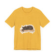 A beautifully detailed watercolor illustration of a sleeping black cat on a comfortable t-shirt