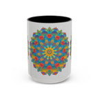 A colorful mug featuring a vibrant mandala art design in yellow, orange, and blue hues