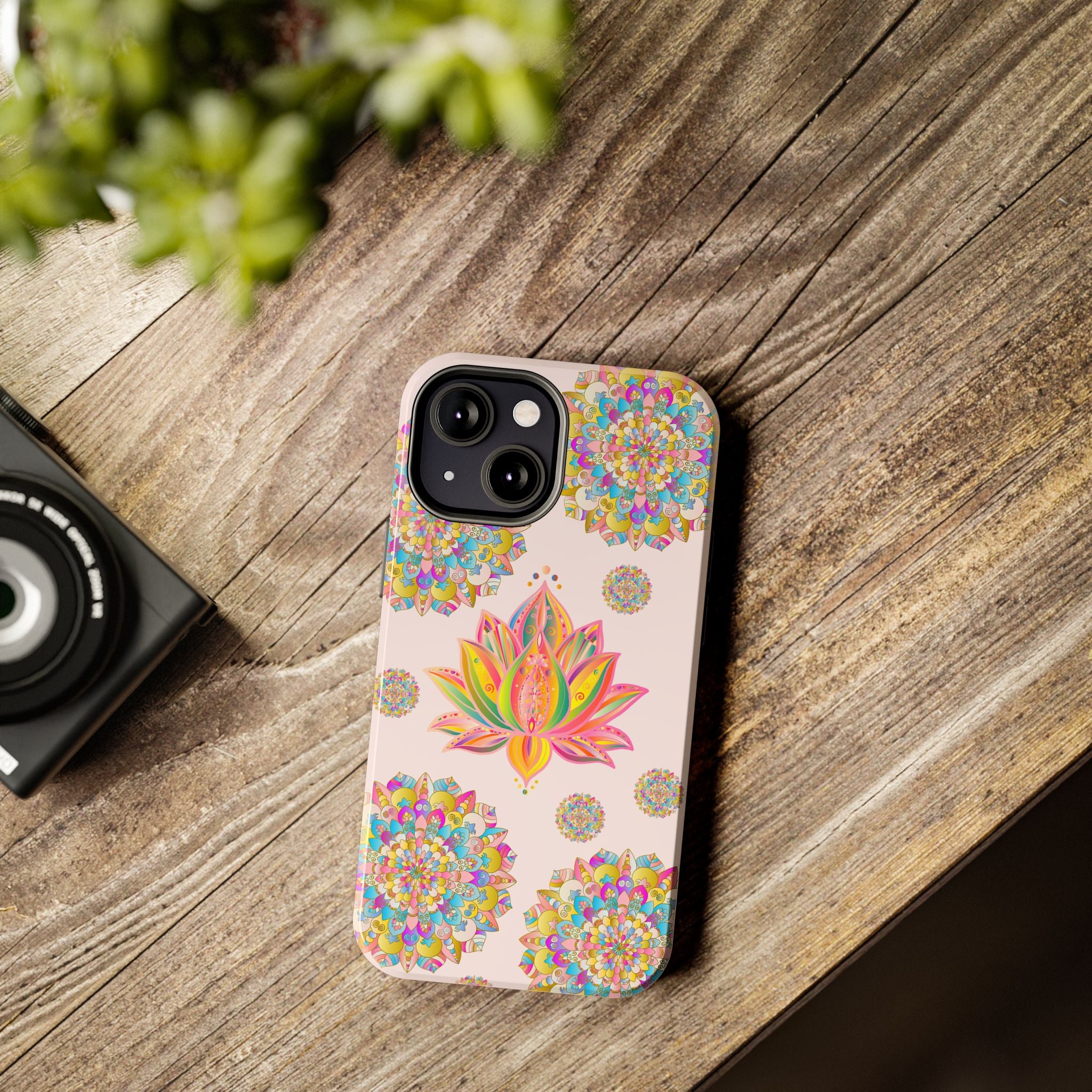 Beautiful light pink phone case featuring intricate lotus flower mandala design