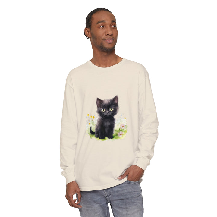 Adorable black kitten playing in a vibrant flower garden on a long sleeve t-shirt