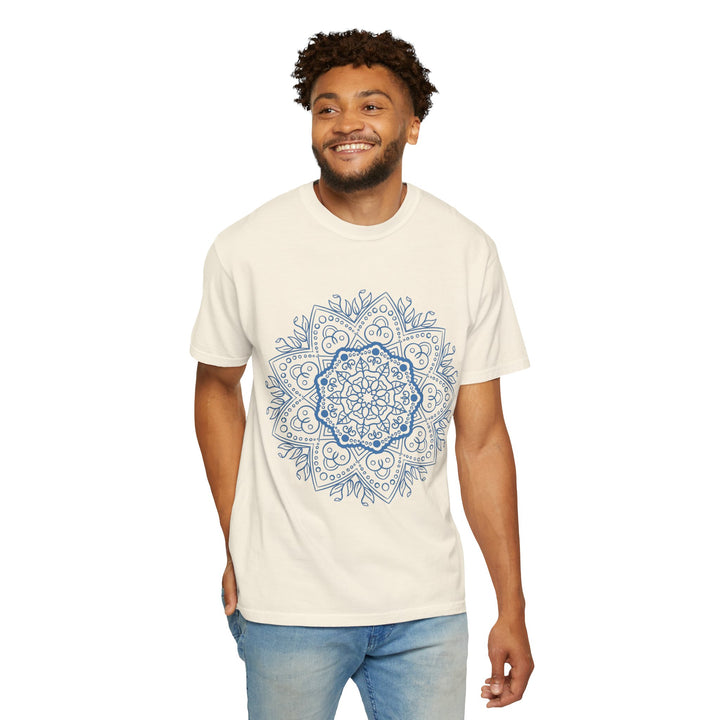 A close-up image of a vibrant, handcrafted mandala art t-shirt, featuring intricate designs, on a unisex garment-dyed tee