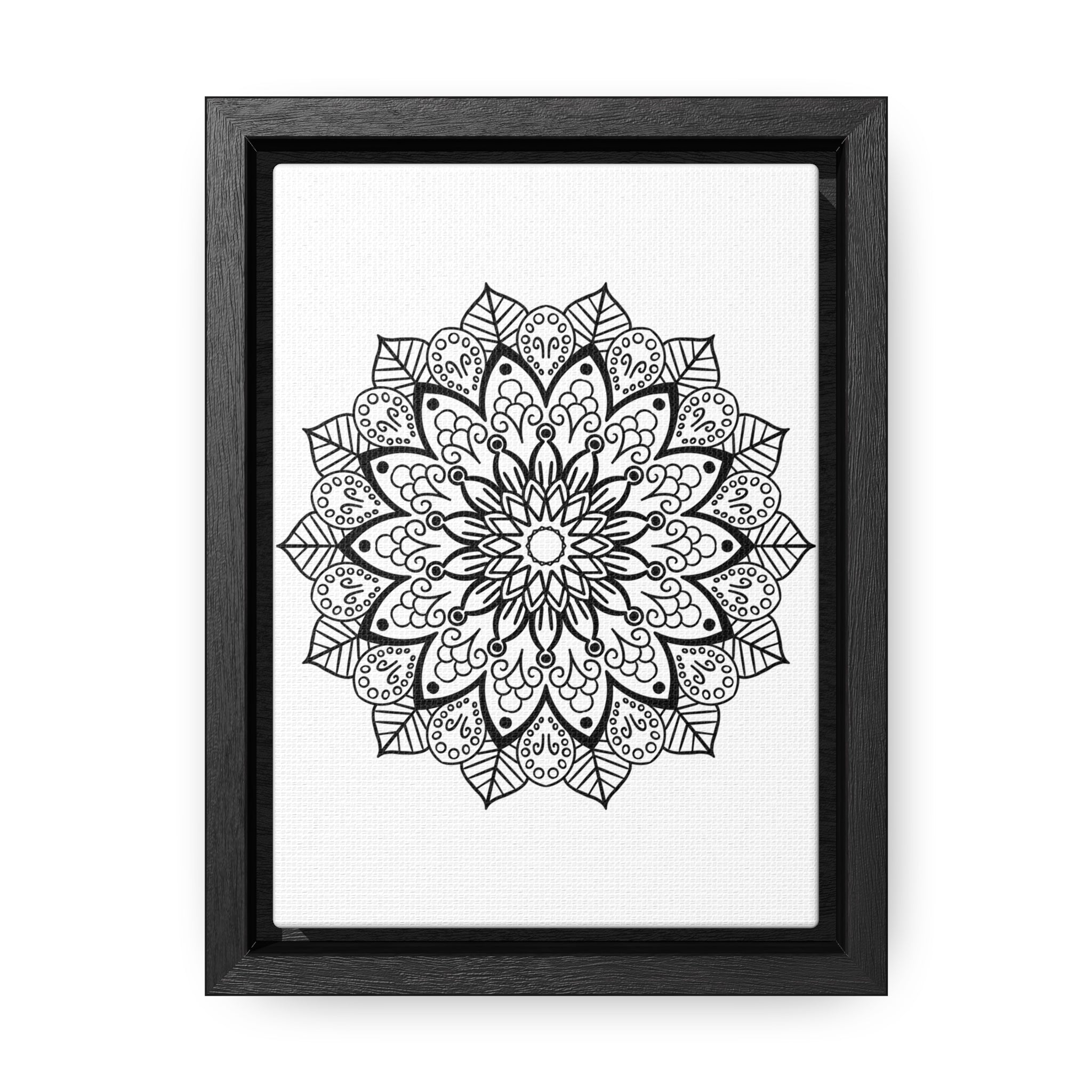 Handmade black and white mandala art on gallery canvas wraps, displayed in a vertical frame