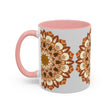 A beautiful mandala art mug with intricate designs on a light grey background