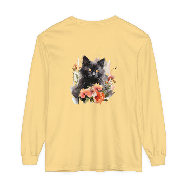 A black cat lounges among colorful flowers on a watercolor t-shirt