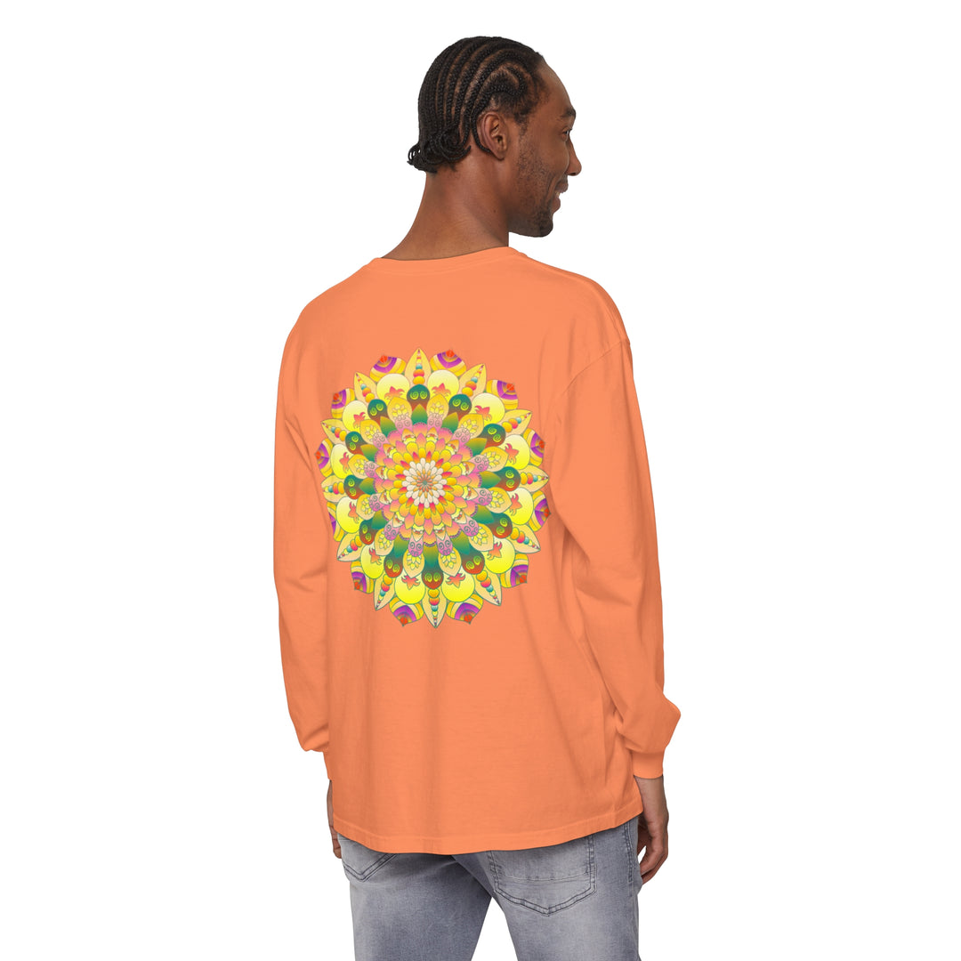 Colorful and intricate mandala design featured on a unisex long sleeve t-shirt