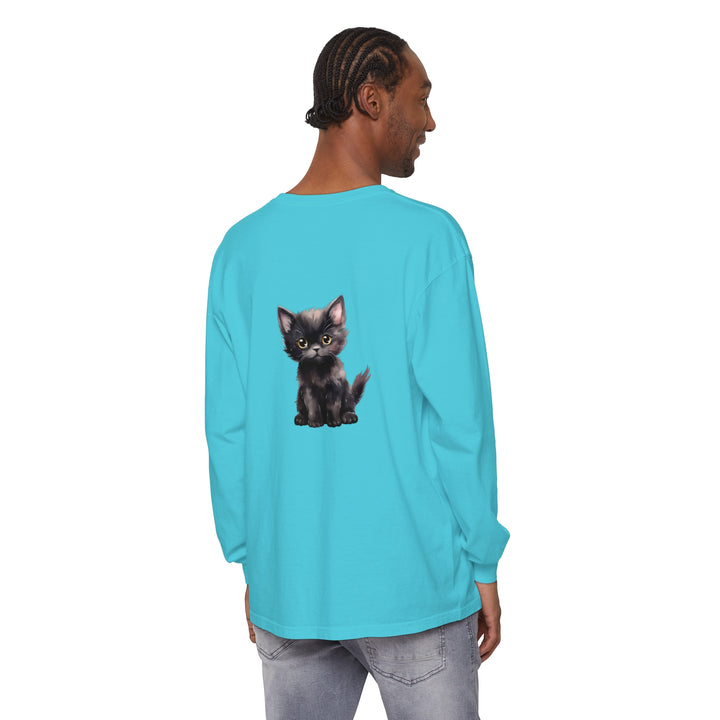 A close-up image of a cute black kitten with striking yellow eyes printed on a comfortable long sleeve t-shirt