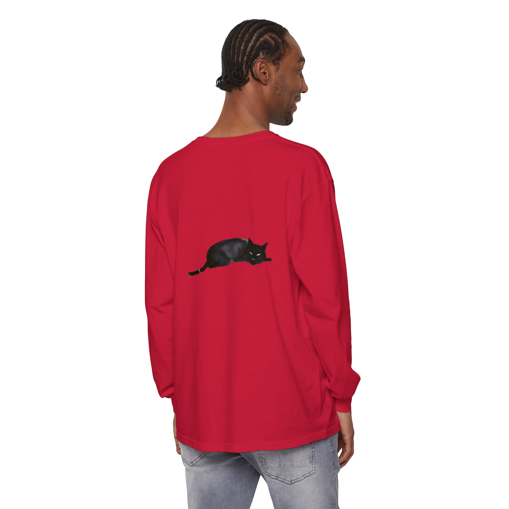 A cozy unisex long sleeve t-shirt featuring a cute black cat sleeping peacefully