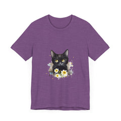 Black cat with piercing yellow eyes staring intensely on a t-shirt