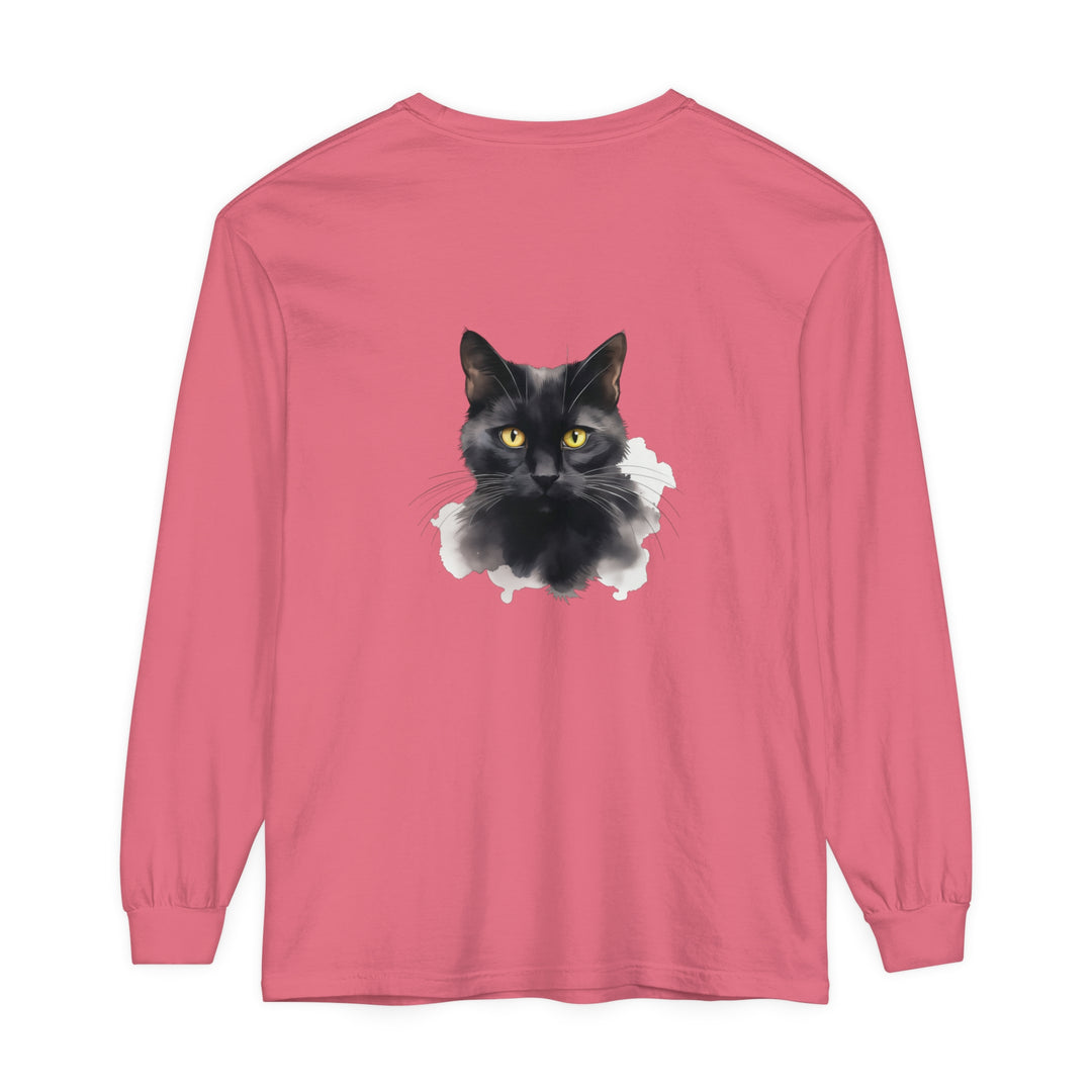 A close-up image of a black cat portrait printed on a unisex long sleeve t-shirt