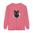 A close-up image of a black cat portrait printed on a unisex long sleeve t-shirt