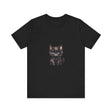A fluffy white kitten with bright blue eyes wearing a playful t-shirt with a cute design