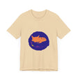 A black cat with glowing yellow eyes rests peacefully on a crescent moon, surrounded by a starry night sky, on a soft and comfortable sleep t-shirt featuring a unique and mysterious design