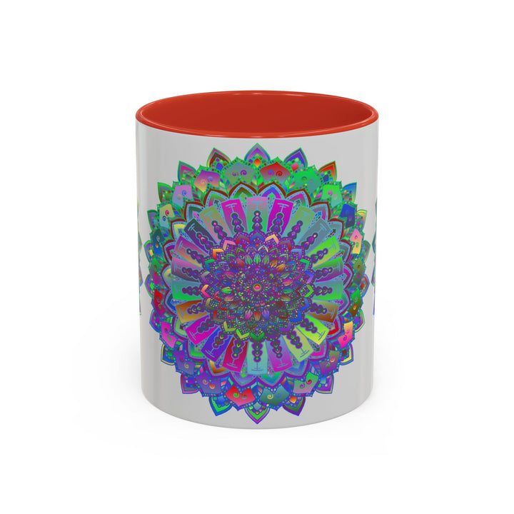 A vibrant and detailed mandala art design adorns a ceramic mug