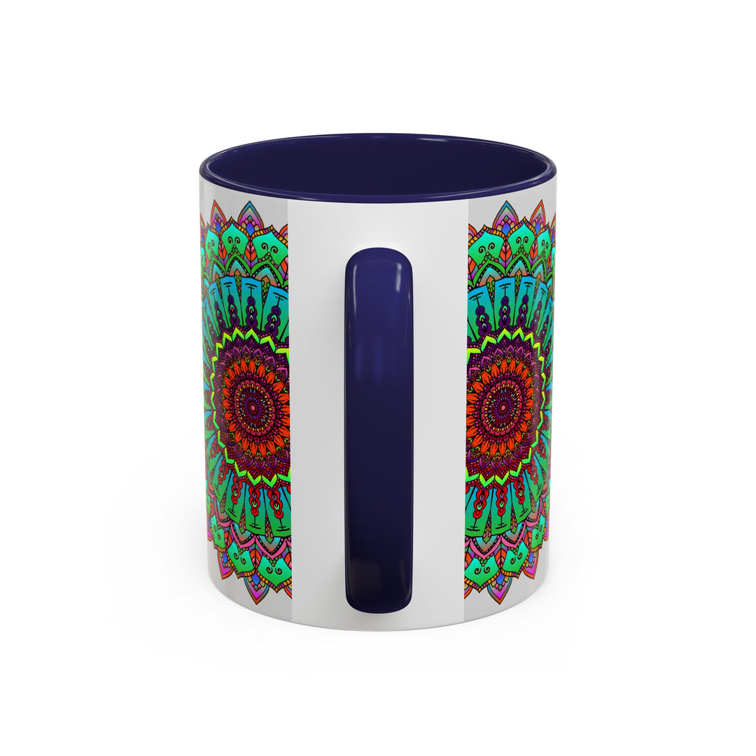 A light grey ceramic mug featuring a colorful mandala art design