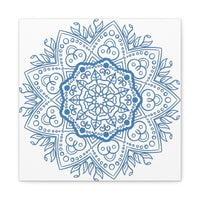 A beautiful handmade mandala design wall art in steel blue color, printed on matte canvas, stretched and framed with a 125 inch frame