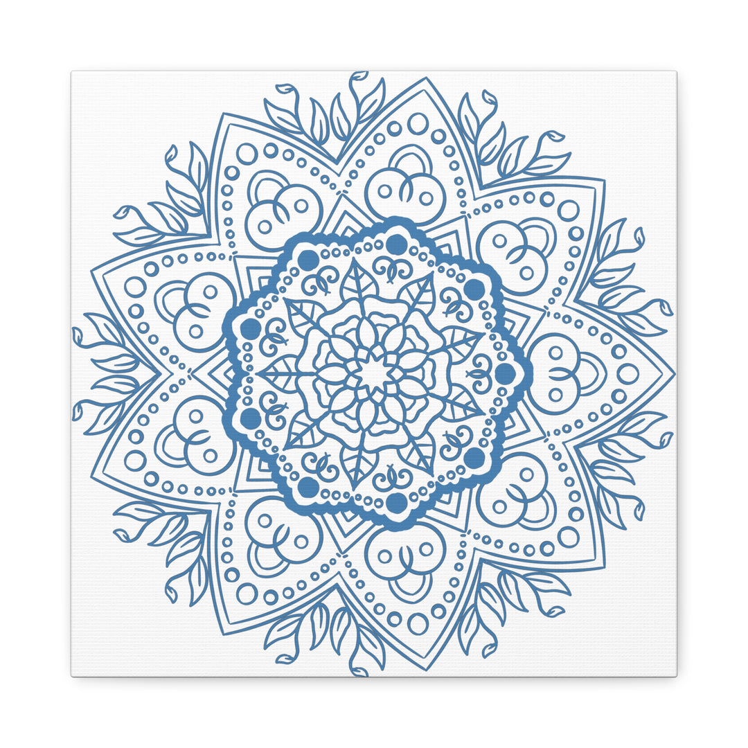 A beautiful handmade mandala design wall art in steel blue color, printed on matte canvas, stretched and framed with a 125 inch frame