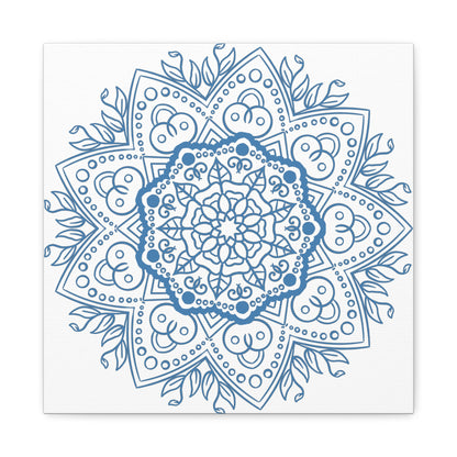 A beautiful handmade mandala design wall art in steel blue color, printed on matte canvas, stretched and framed with a 125 inch frame