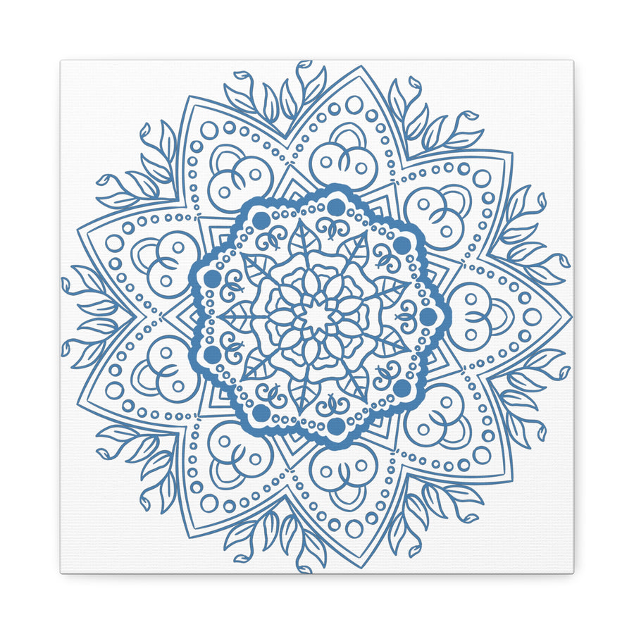 A beautiful handmade mandala design wall art in steel blue color, printed on matte canvas, stretched and framed with a 125 inch frame