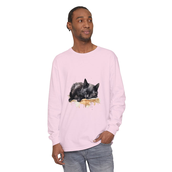 A detailed watercolor illustration of a sleeping black cat on a t-shirt