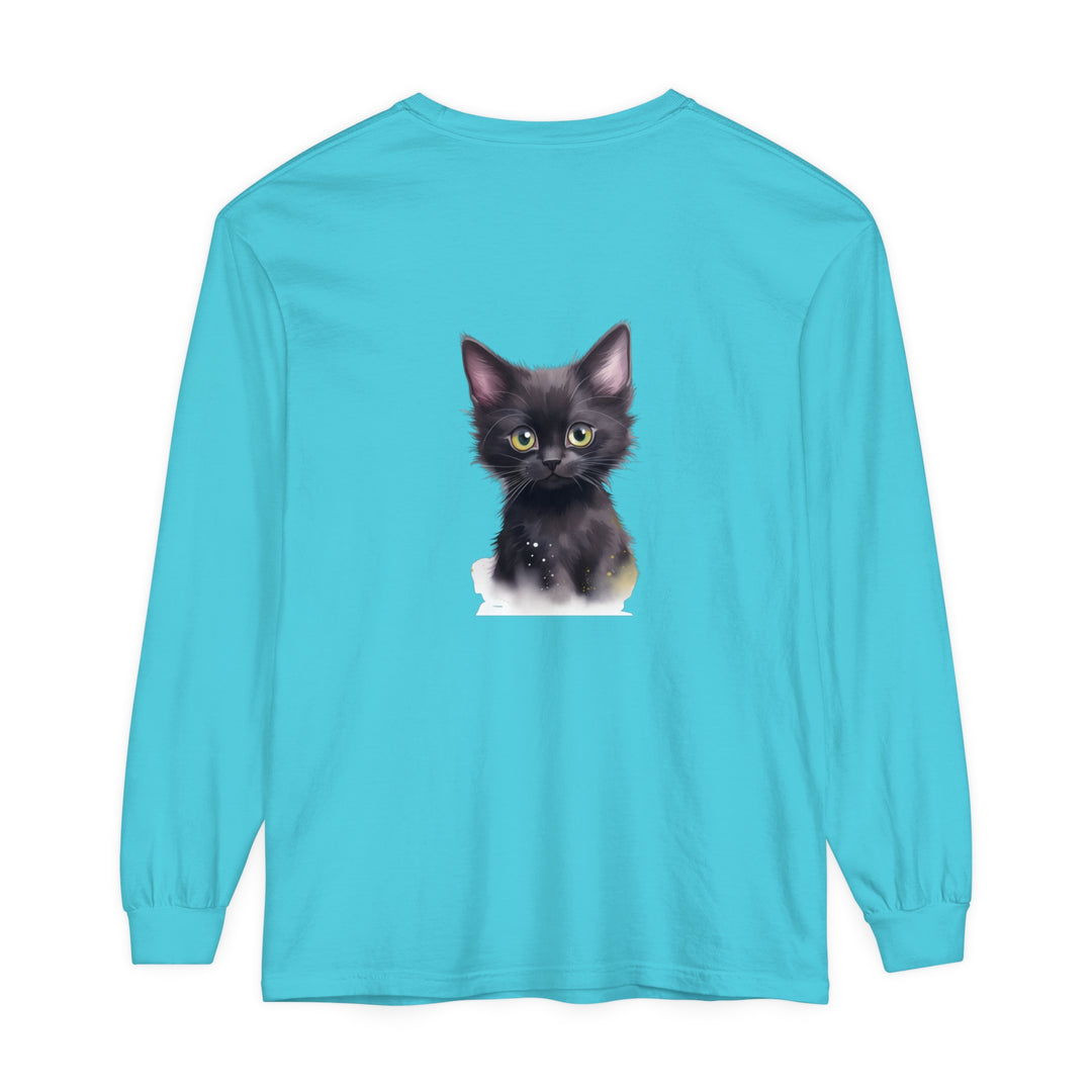 A close-up image of a cute black kitten with vibrant green eyes printed on a soft and comfortable t-shirt