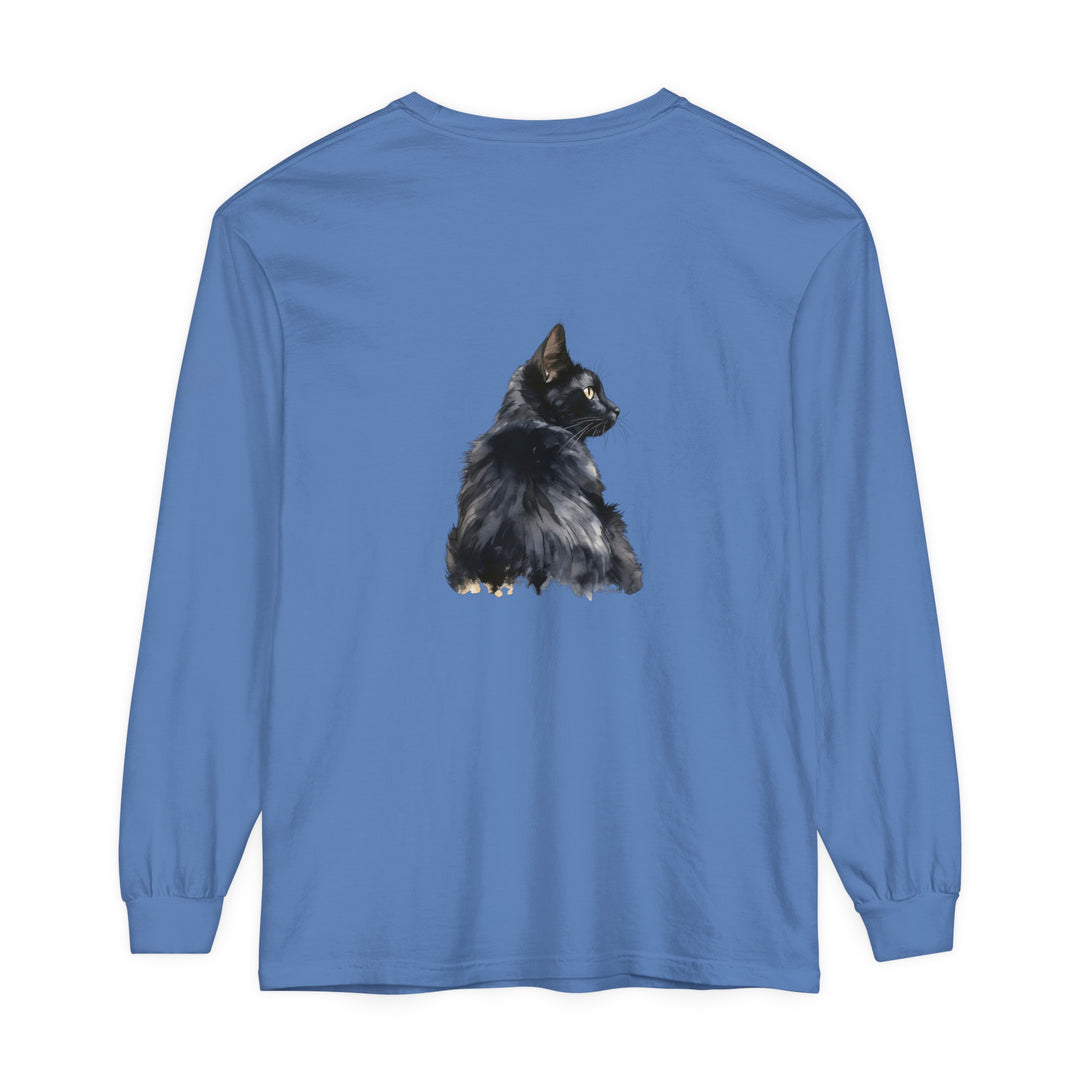 A close-up of a black cat watercolor print on a long sleeve t-shirt