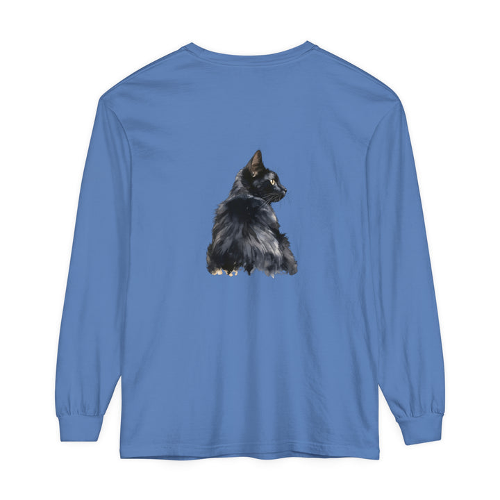 A close-up of a black cat watercolor print on a long sleeve t-shirt