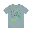 A black t-shirt with a neon silhouette of a cat jumping away in fear from a cucumber, creating a humorous and playful image