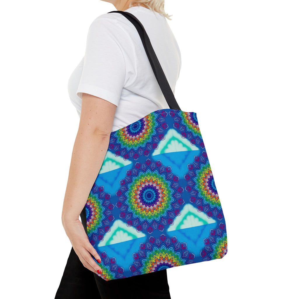 A vibrant, multi-colored mandala tote bag with intricate, symmetrical patterns