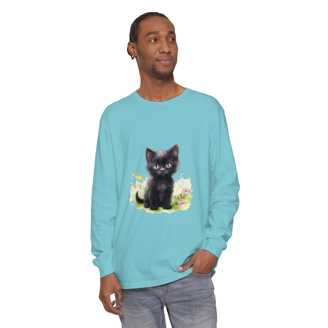 A cute black kitten playing in a colorful flower garden printed on a long sleeve t-shirt