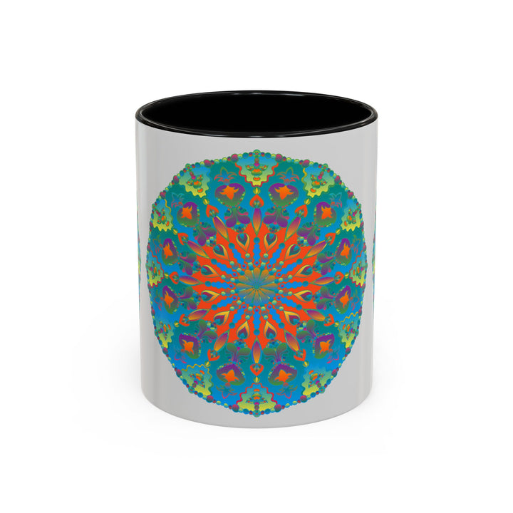 A close-up image of a white ceramic mug with an intricate mandala design in shades of blue and green, perfect for enjoying your favorite hot beverage