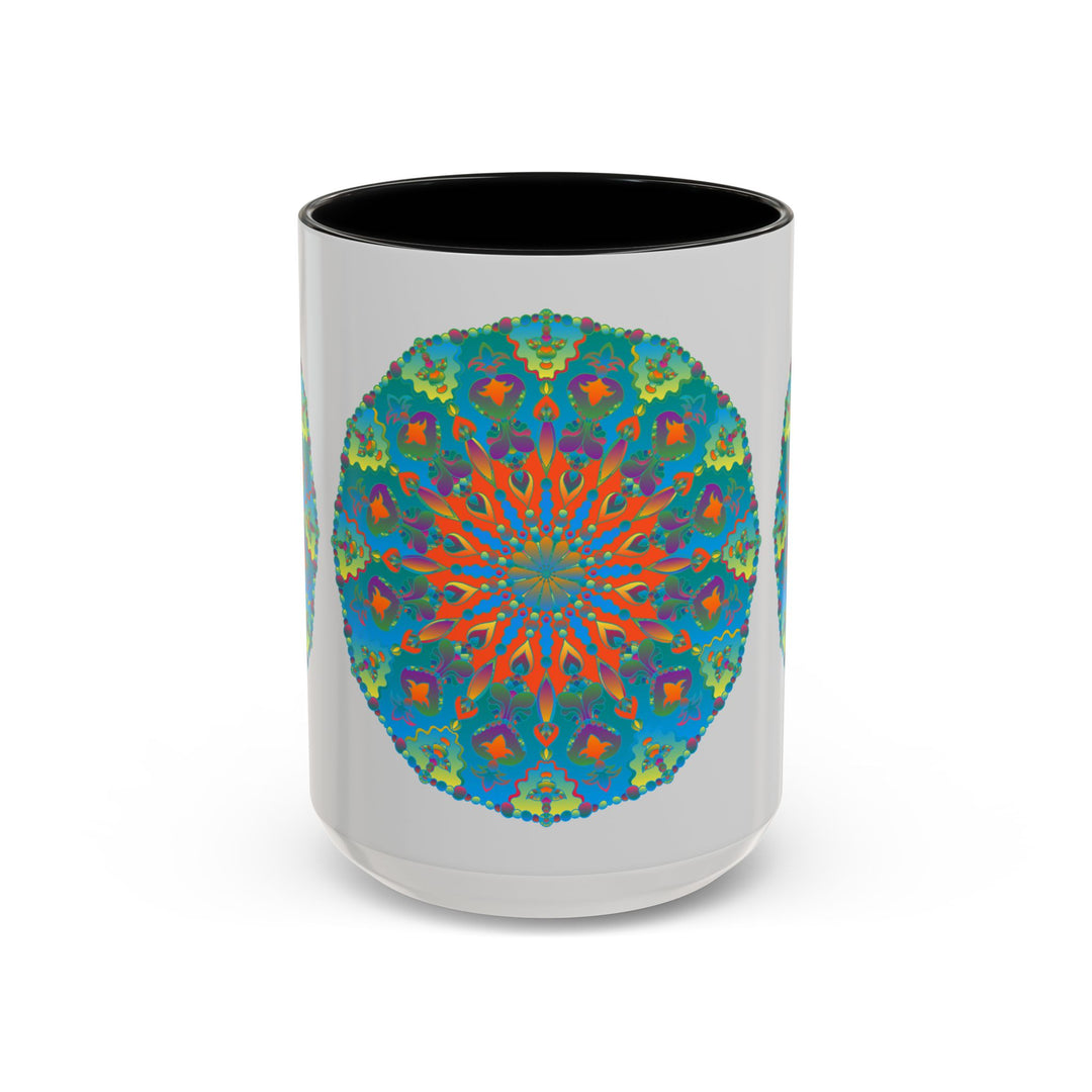 A beautiful ceramic mug featuring a mandala art design in shades of blue and green intricately painted on its surface