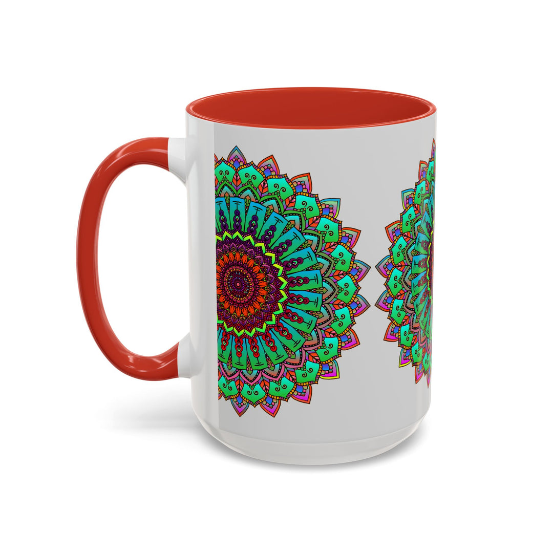 A light grey ceramic mug featuring a colorful mandala art design