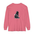 A long sleeve t-shirt featuring a watercolor illustration of a black and white cat