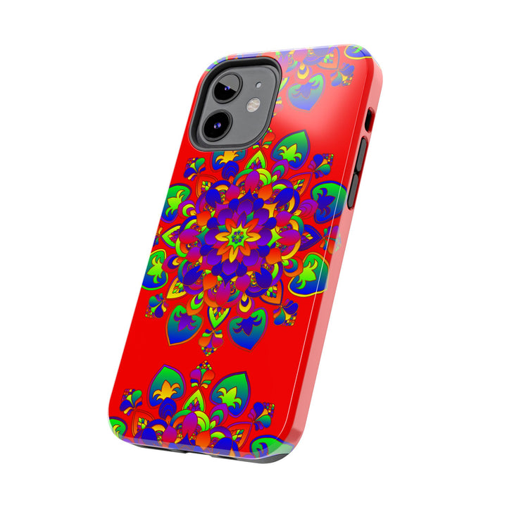 A unique and intricate hand-drawn red mandala art design on a phone case