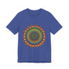 A close-up image of a vibrant and intricate mandala pattern on a meditation tee, featuring an array of bright and bold colors