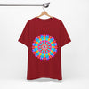 Vibrantly colored mandala design on a t-shirt, featuring psychedelic art