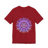 A vibrant purple and gold mandala tee featuring intricate spiritual art design